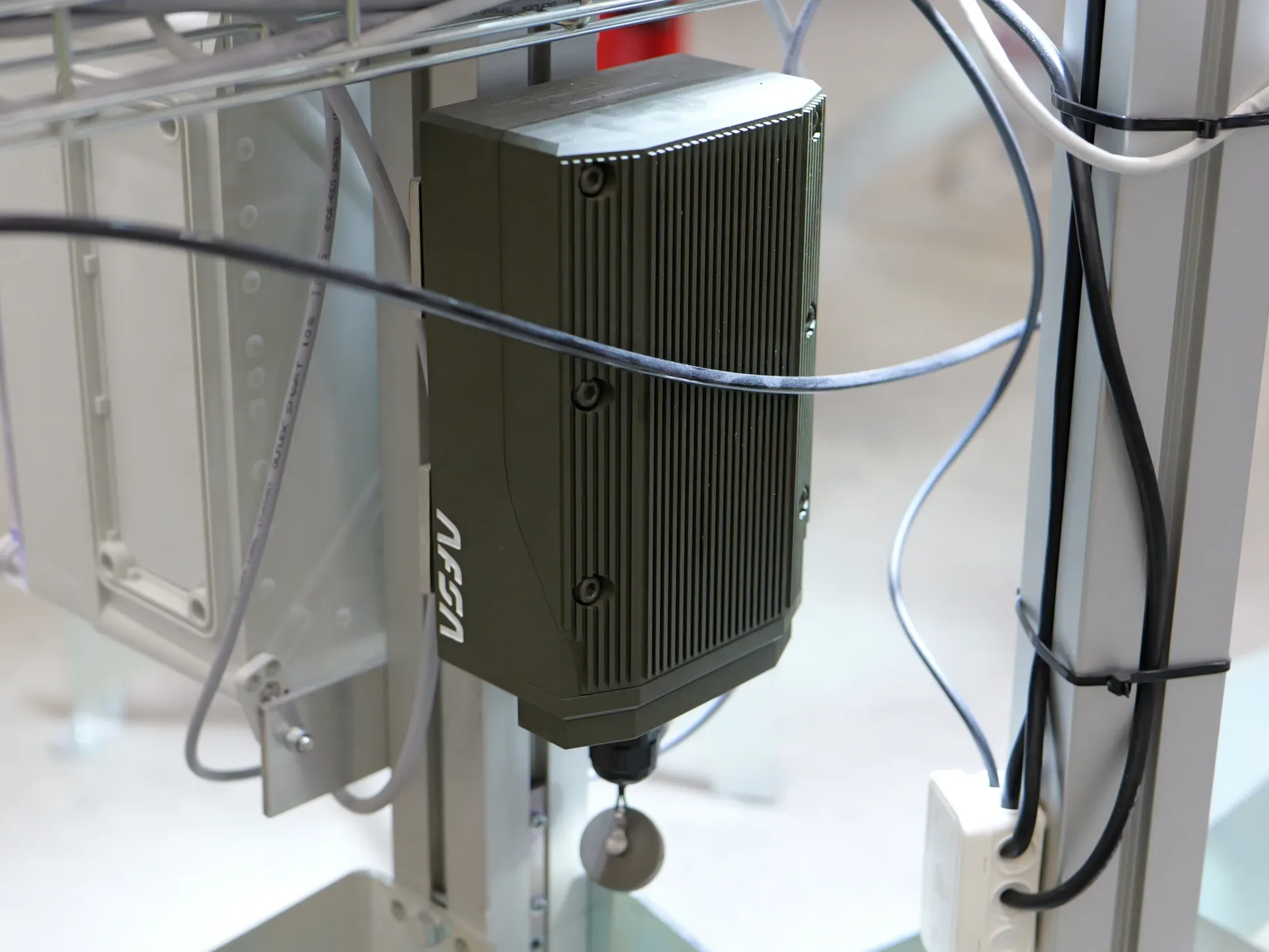 MarshallAI REID Edge Processing device installed next to production line